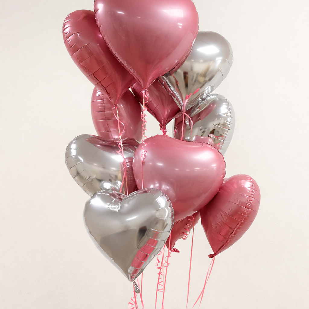 11 pink and silver heart balloons