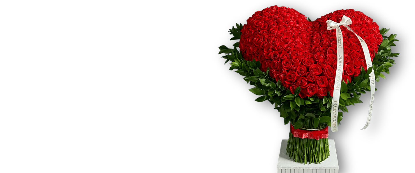 Heart-shaped arrangement of red roses with green leaves on a blue background1621243260e1af0c20-0