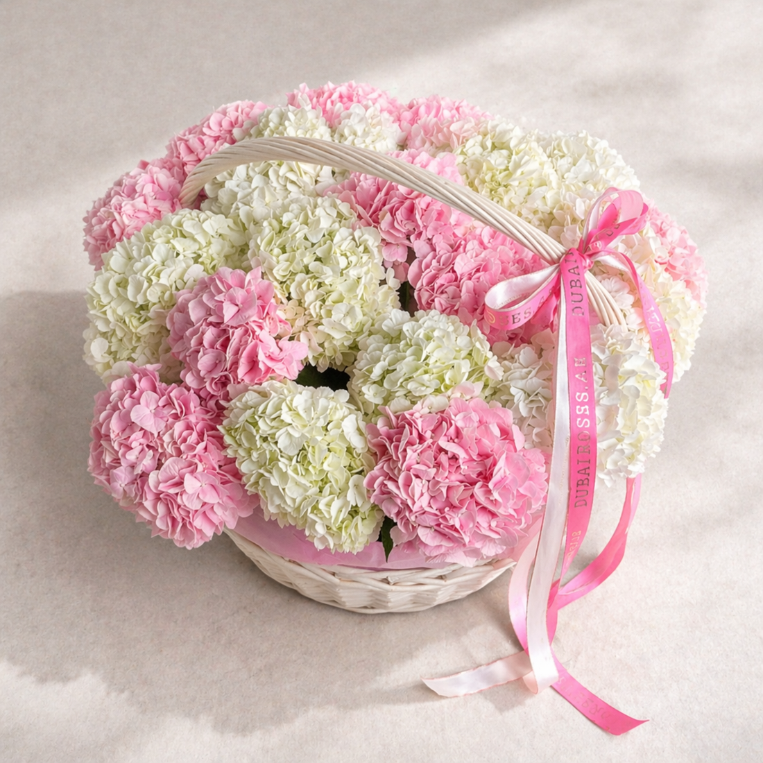 white and pink hydrangea basket 