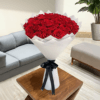 50 red roses in white wrapping in dubai