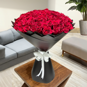 100 red roses in black wrapping in dubai