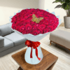 100 red roses in white wrapping in dubai