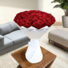 100 red roses in white wrapping in dubai