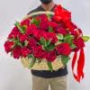 100 red roses in basket