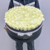 white roses in box