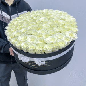 white roses in box