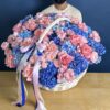 Blue and Pink Hydrangea with pink julieta roses and pink french roses in basket