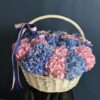 A basket of premium pink and blue hydrangeas